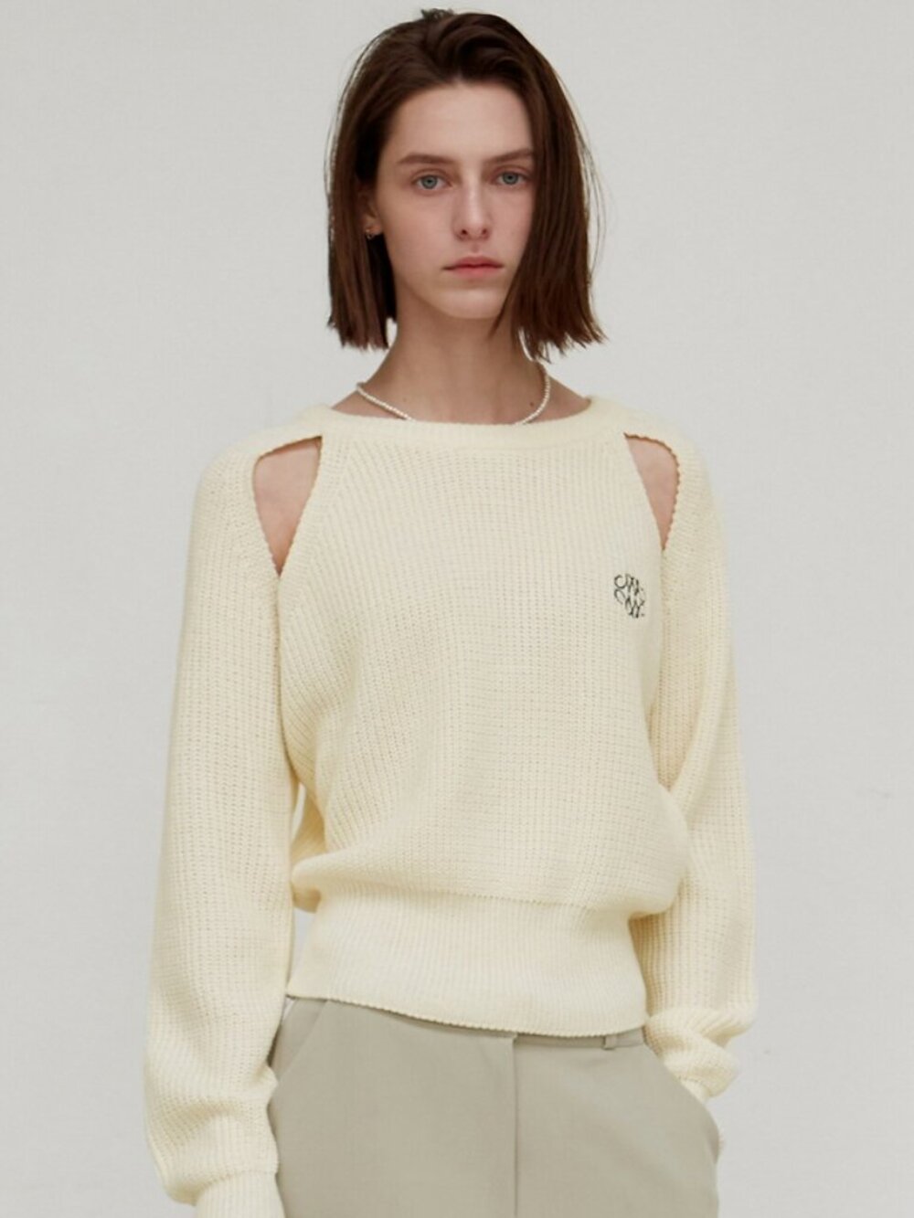 NICK&NICOLE Ribbed Cut Out Knit Top in Ivory